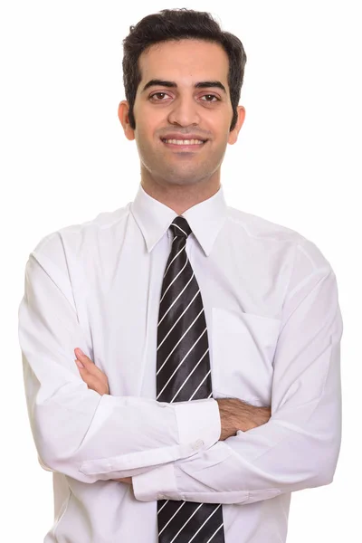 Jovem feliz empresário persa sorrindo com os braços cruzados — Fotografia de Stock