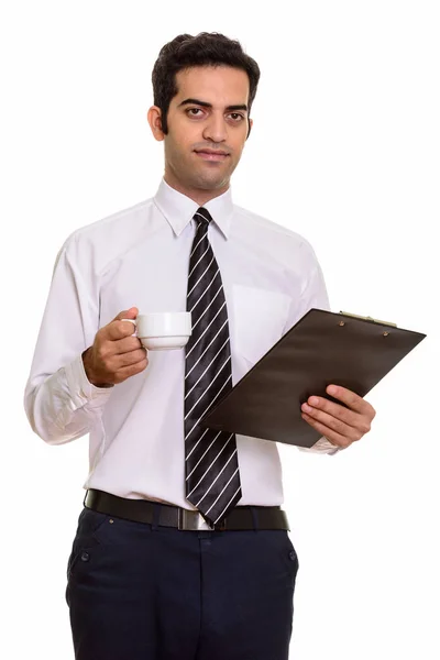 年轻的波斯商人拿着剪贴板和咖啡杯查出在白色背景 — 图库照片