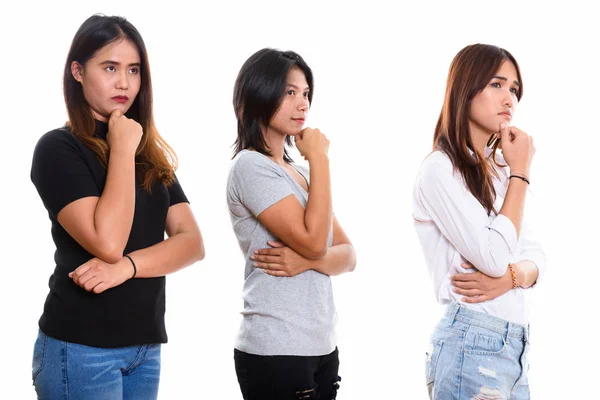 Studio colpo di tre giovane asiatico donna amici pensare mentre lo — Foto Stock