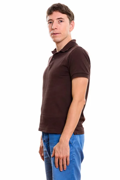 Studio shot of man standing against white background — Stock Photo, Image