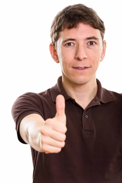 Studio shot of man giving thumb up — Stock Photo, Image