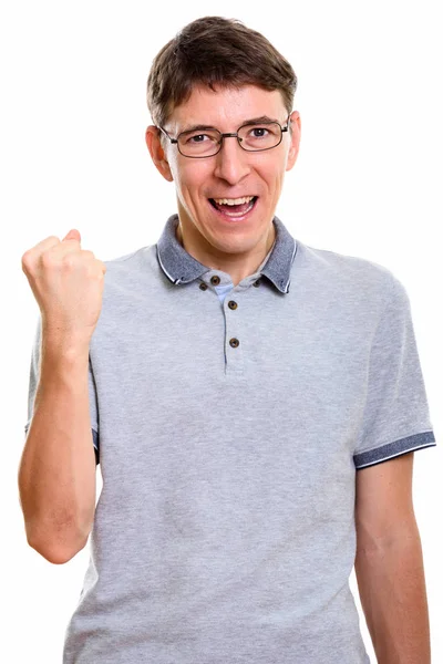 Estúdio tiro de homem feliz sorrindo enquanto parece motivado — Fotografia de Stock