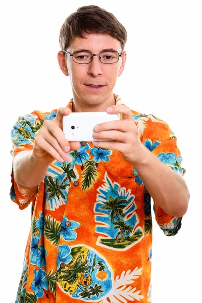 Estudio de toma de foto del hombre con el teléfono móvil — Foto de Stock