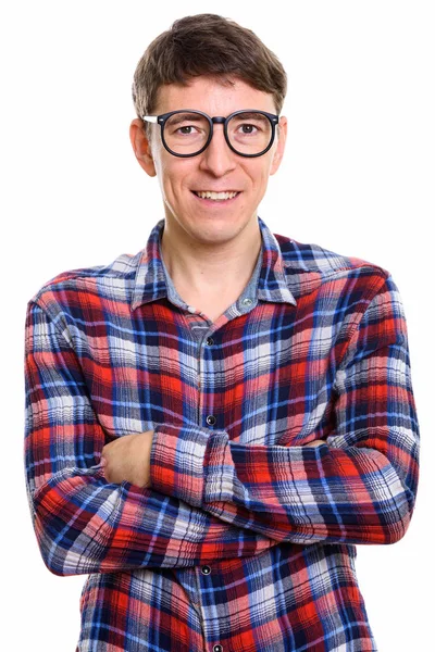 Studio shot de l'homme heureux souriant tout en portant des lunettes avec un — Photo