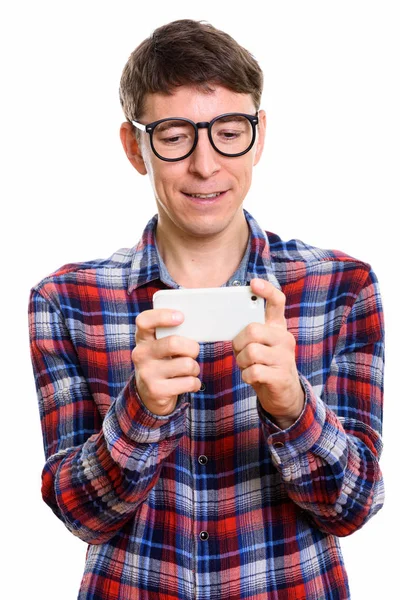 Studio shot of man using mobile phone — Stock Photo, Image