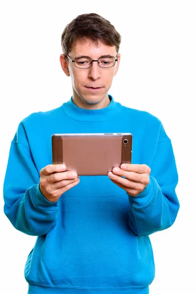 Studio shot of man using digital tablet — Stock Photo, Image