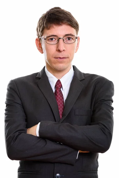 Studio shot of businessman wearing eyeglasses with arms crossed — Stock Photo, Image