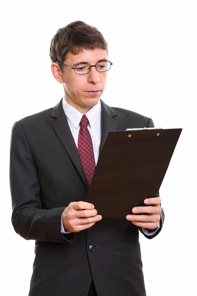 Estudio plano de hombre de negocios leyendo en el portapapeles — Foto de Stock