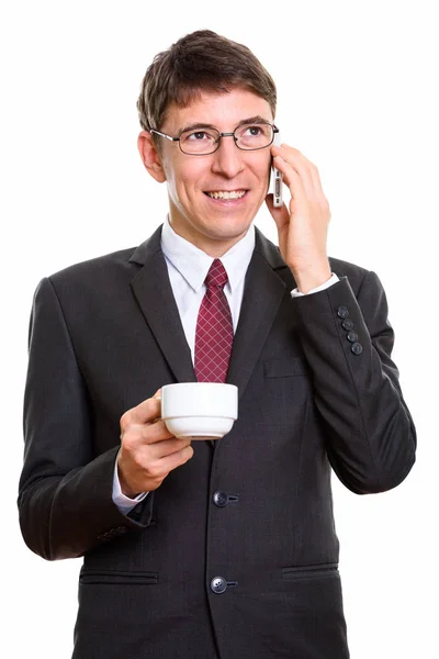 携帯電話で話しながら笑って思慮深い幸せなビジネスマン — ストック写真