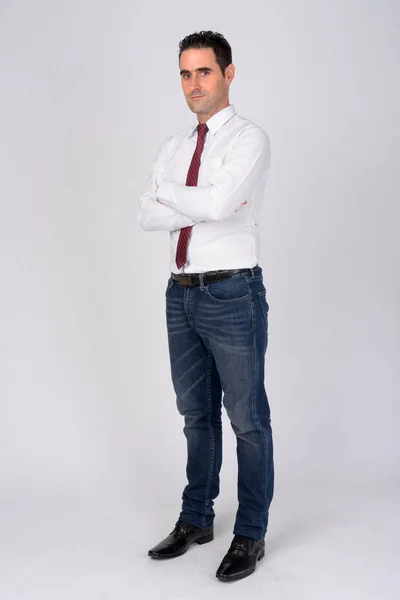 Full body shot of handsome businessman against white background — Stock Photo, Image