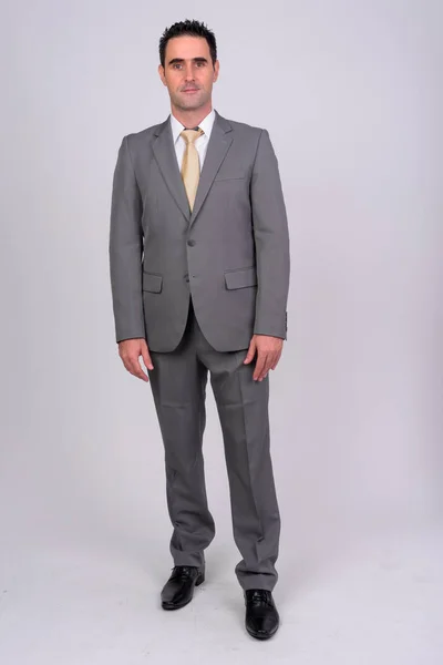 Full body shot of handsome businessman wearing suit — Stock Photo, Image