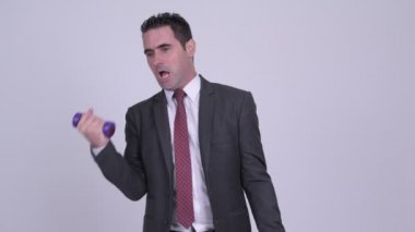 Yakışıklı işadamı ile halter egzersiz