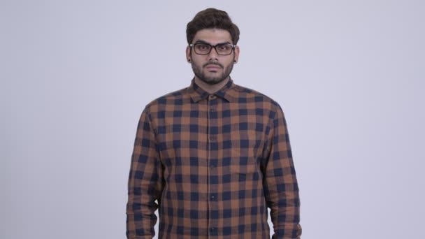 Young bearded Indian hipster man covering mouth as three wise monkeys concept — Stock Video