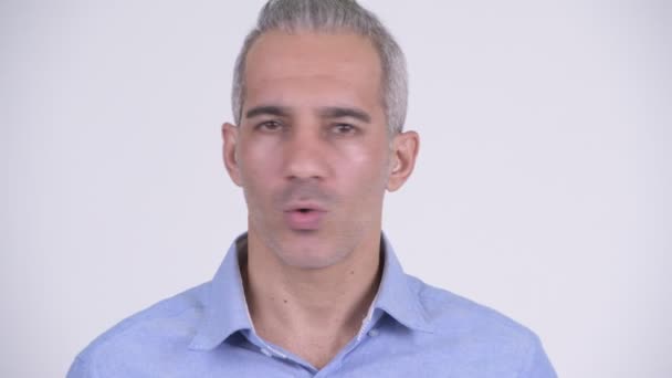 Persisk affärsman nickande huvud inte mot vit bakgrund — Stockvideo