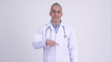 Beyaz arka plan karşı işaret mutlu Farsça adam doktor