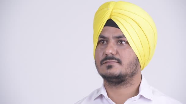 Rostro del hombre de negocios Sikh indio barbudo con pensamiento turbante — Vídeo de stock