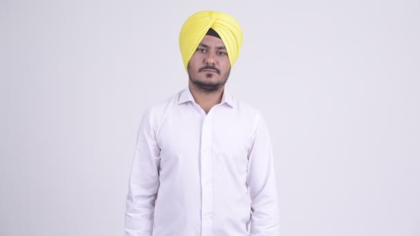Skäggig indisk Sikh affärsman ger handslag — Stockvideo