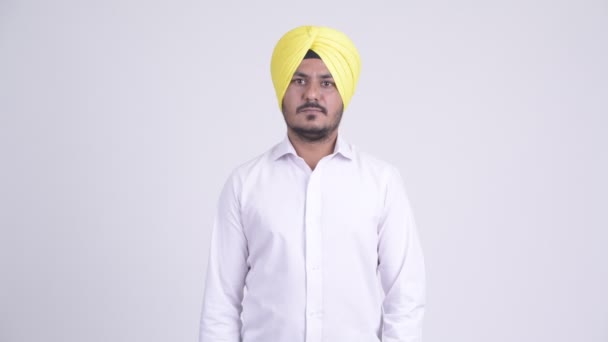 Betonade skäggig indisk Sikh affärsman få dåliga nyheter — Stockvideo