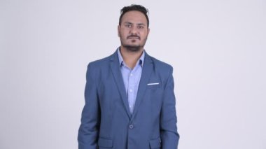 Mutlu el sallayarak Hintli işadamı sakallı