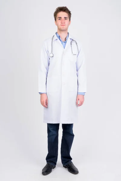 Full body shot of young handsome man doctor — Stock Photo, Image