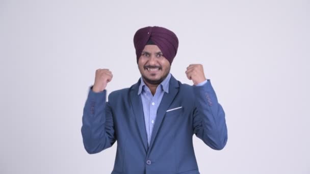 Happy bearded Indian Sikh businessman in fighting stance — Stock Video