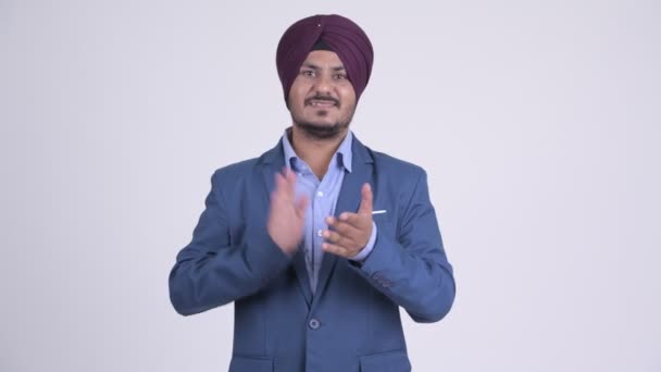 Boldog szakállas indiai szikh üzletember taps kezek — Stock videók