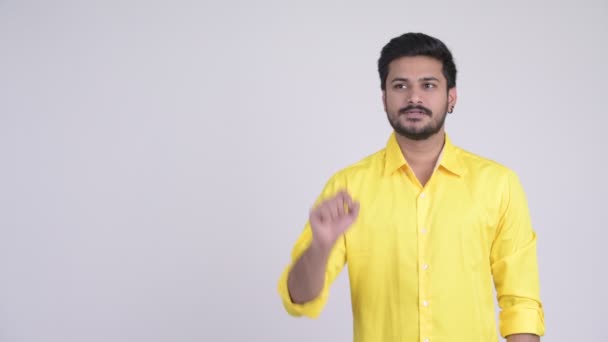 Young Handsome Bearded Indian Businessman White Background — Stock Video