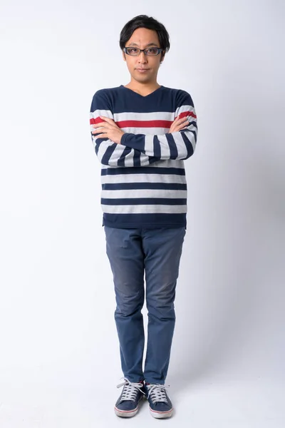 Full body shot of Japanese man with arms crossed — Stock Photo, Image