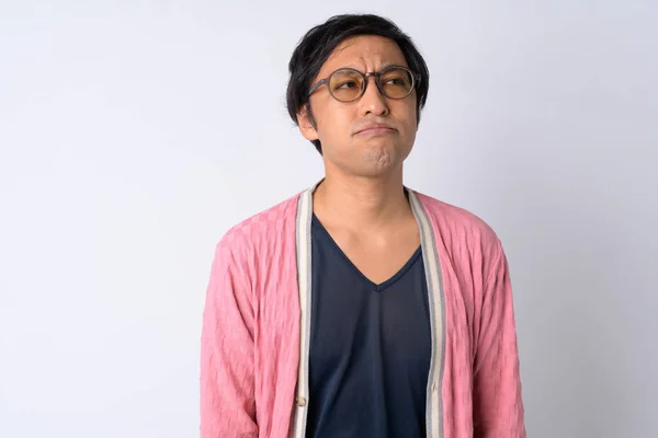 Portrait of Japanese man looking bored and tired — Stock Photo, Image