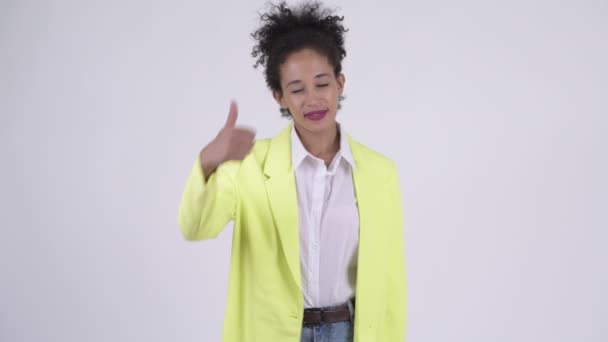 Happy young beautiful African businesswoman giving thumbs up — Stock Video