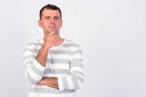 Portrait of man thinking against white background — Stock Photo, Image
