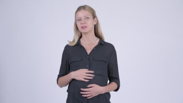 Unga vackra gravid affärskvinna förklara något — Stockvideo