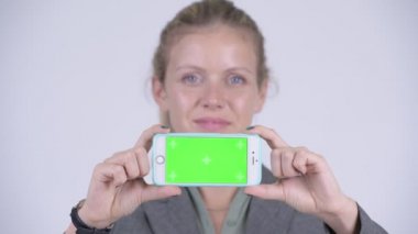 Genç mutlu sarışın işkadını gösteren telefon yüzü