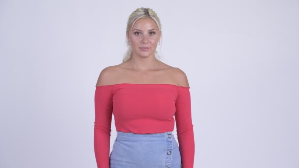 Young stressed blonde woman giving thumbs down — Stock Video