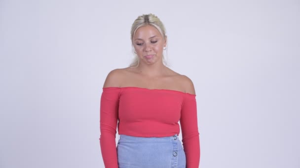 Young stressed blonde woman looking bored and tired — Stock Video