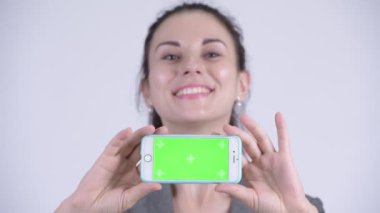 Telefon gösteren mutlu genç güzel işkadını yüz