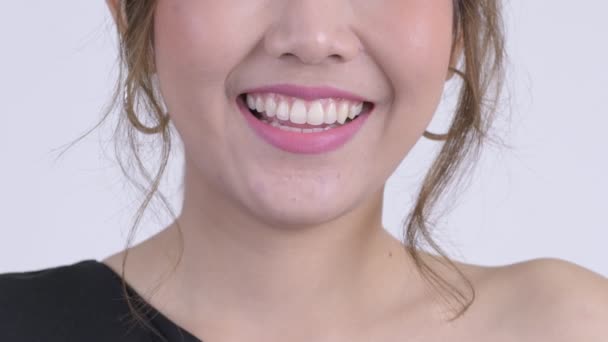 Sonrisa de feliz joven mujer asiática — Vídeo de stock