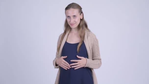 Heureux jeune belle femme enceinte pensant — Video