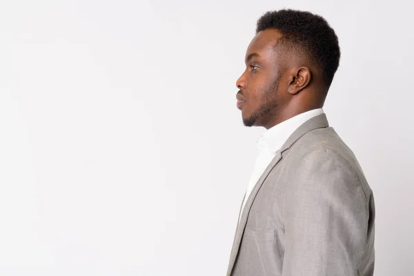 Vue du profil de jeune homme d'affaires africain en costume — Photo