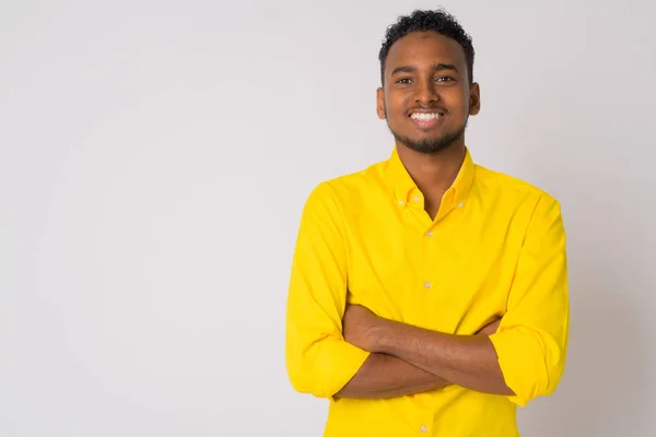 Mutlu genç yakışıklı Afrika işadamı silah ile gülümseyen geçti