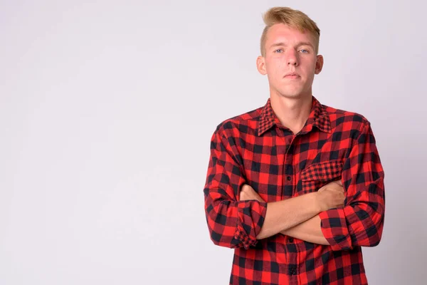 Portrait of young blonde hipster man with arms crossed — Stock Photo, Image