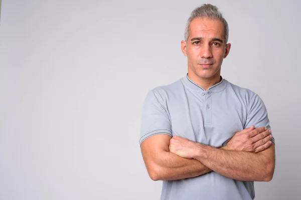 Portrait of handsome Persian man with arms crossed — Stock Photo, Image