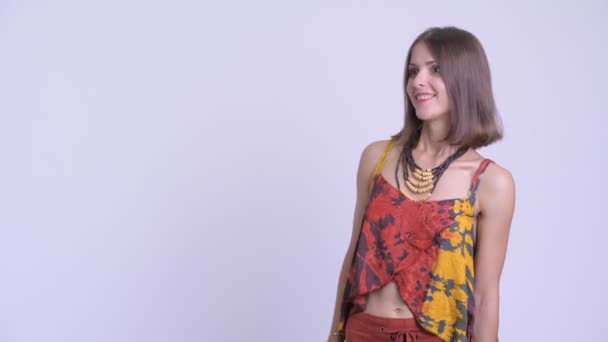 Gelukkige jonge mooie hipster vrouw iets te raken en op zoek verrast — Stockvideo