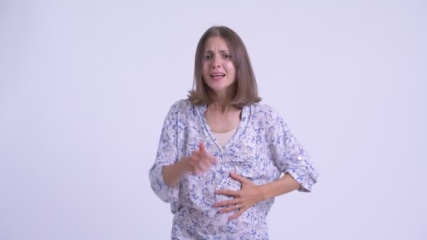 Наголошена молода вагітна жінка отримує погані новини — стокове відео
