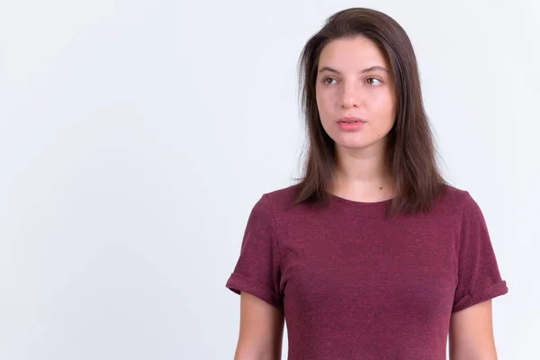 Retrato de jovem mulher bonita pensando e olhando para cima — Fotografia de Stock