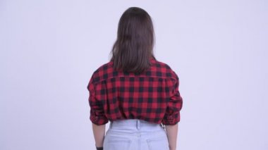 Genç hipster kadın düşünme ve bekleme arka görünümü