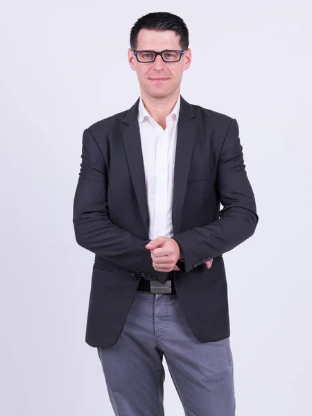 Portrait of handsome businessman in suit wearing eyeglasses — Stock Photo, Image