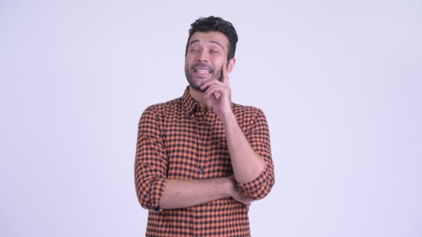 Щасливий бородатий Перська хіпстер людина думає — стокове відео