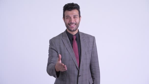 Щасливий бородатий персидський бізнесмен даючи рукостискання — стокове відео