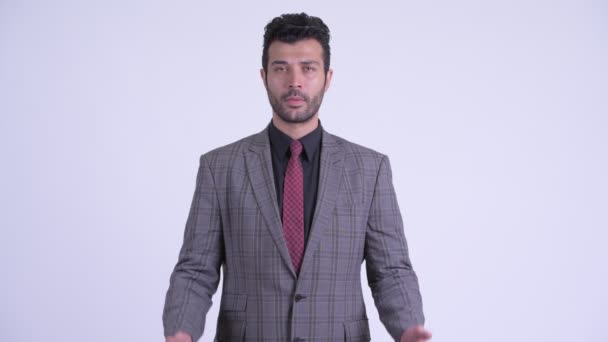 Гарний бородатий персидський бізнесмен робить не бачу зла концепція — стокове відео